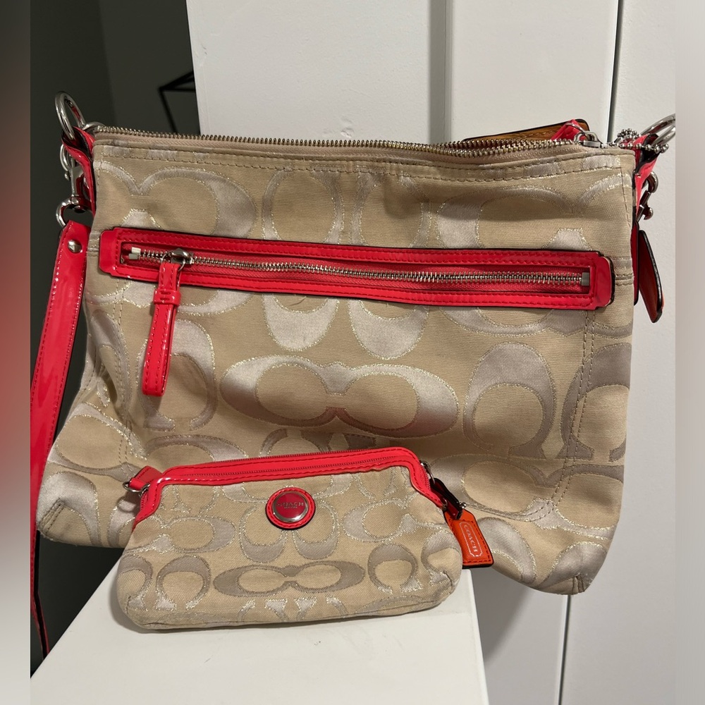 Coach crossbody hand bag and matching wallet.